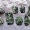 Seraphinite Seraphinite gemstone crystals. Six cabochons and two tumbled stones. Shapes include ovals, peardrops and oblongs. Dark green with appearance of pale green wings, hence the association with seraphim angels.