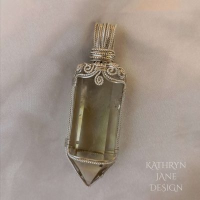 Elegant citrine point pendant in sterling and Argentium sterling silver.