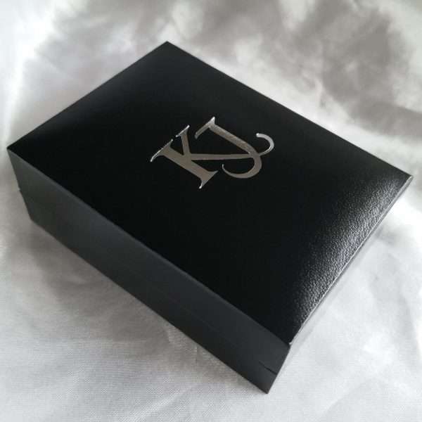 Pendant will be presented in a beautiful Kathryn Jane Design jewellery box - black exterior faux leather with embossed silver K J lettering. White satin background.
