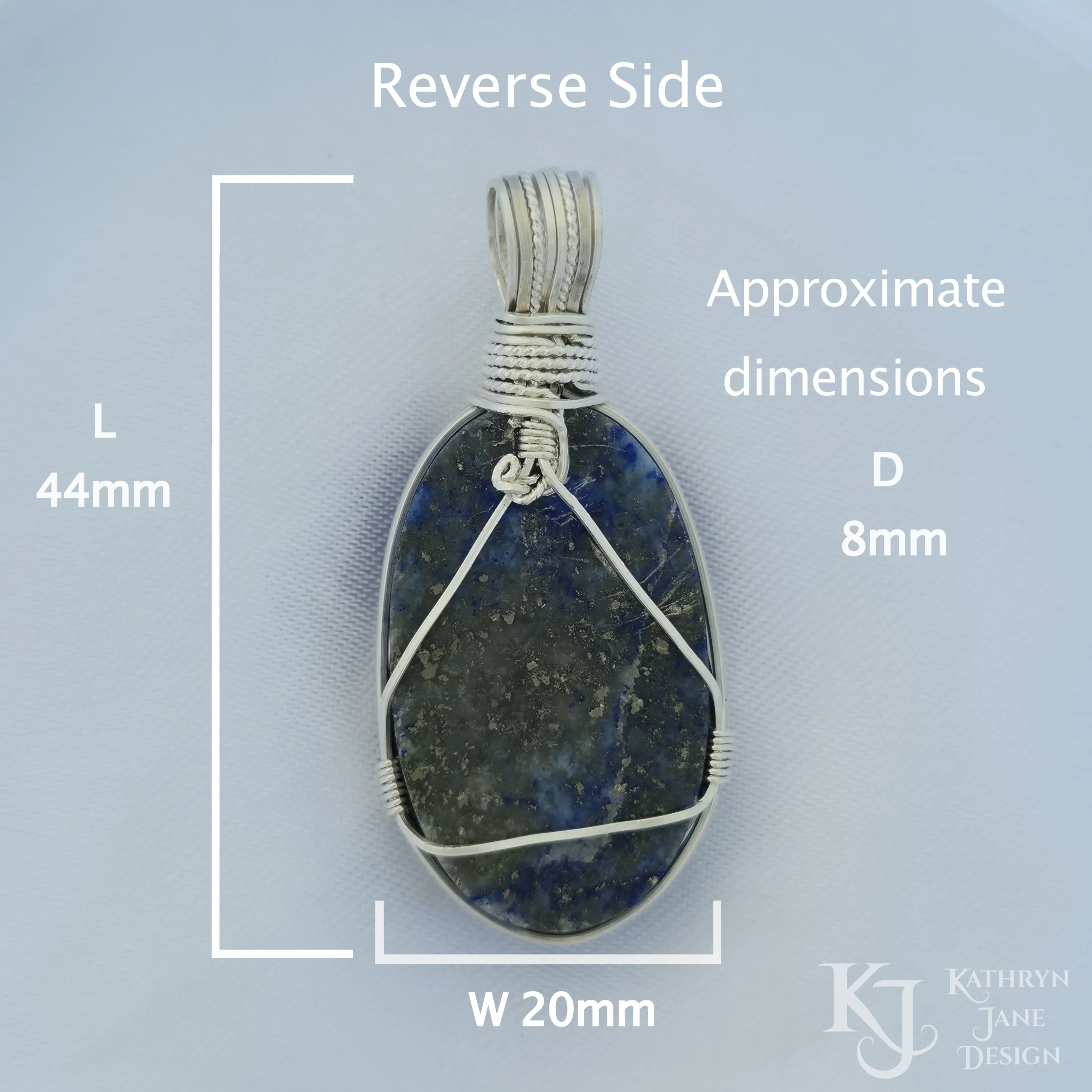 Kathryn Jane Design wire-wrapped lapis lazuli pendant with sterling silver forming a framework. White background. Reverse side. Length 44mm, width 20mm, depth 8mm