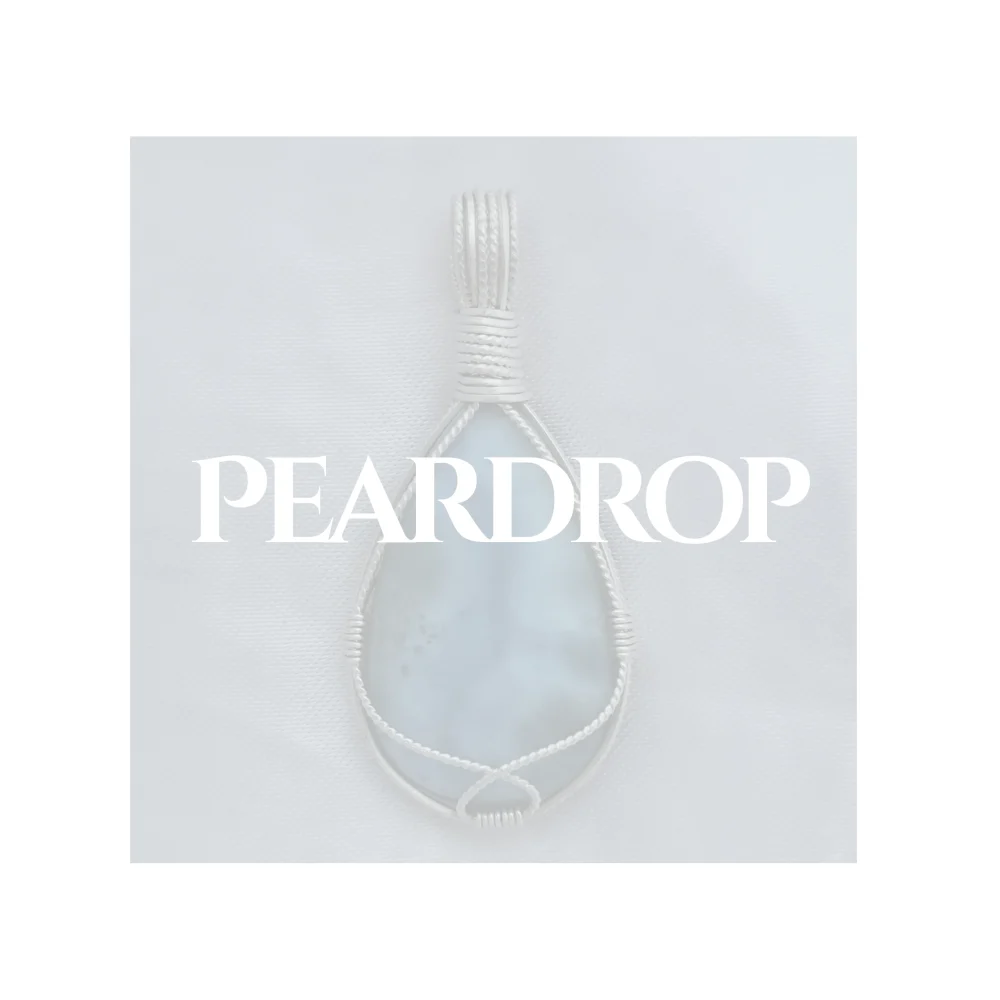 Peardrop title ofer a whited out image of a handcrafted larimar sterling silver pendant.