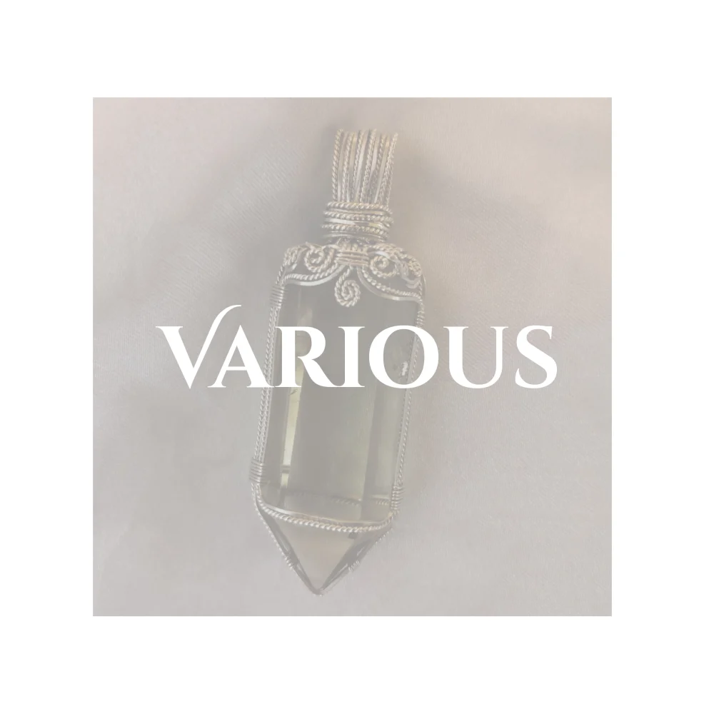 Various title over a whited out photo of a large cut citrine point, cradled in sterling silver square and twisted elements, with twisted silver spirals on the top. Heading page for gallery of variously-shaped handcrafted crystal pendants by Kathryn Jane Design