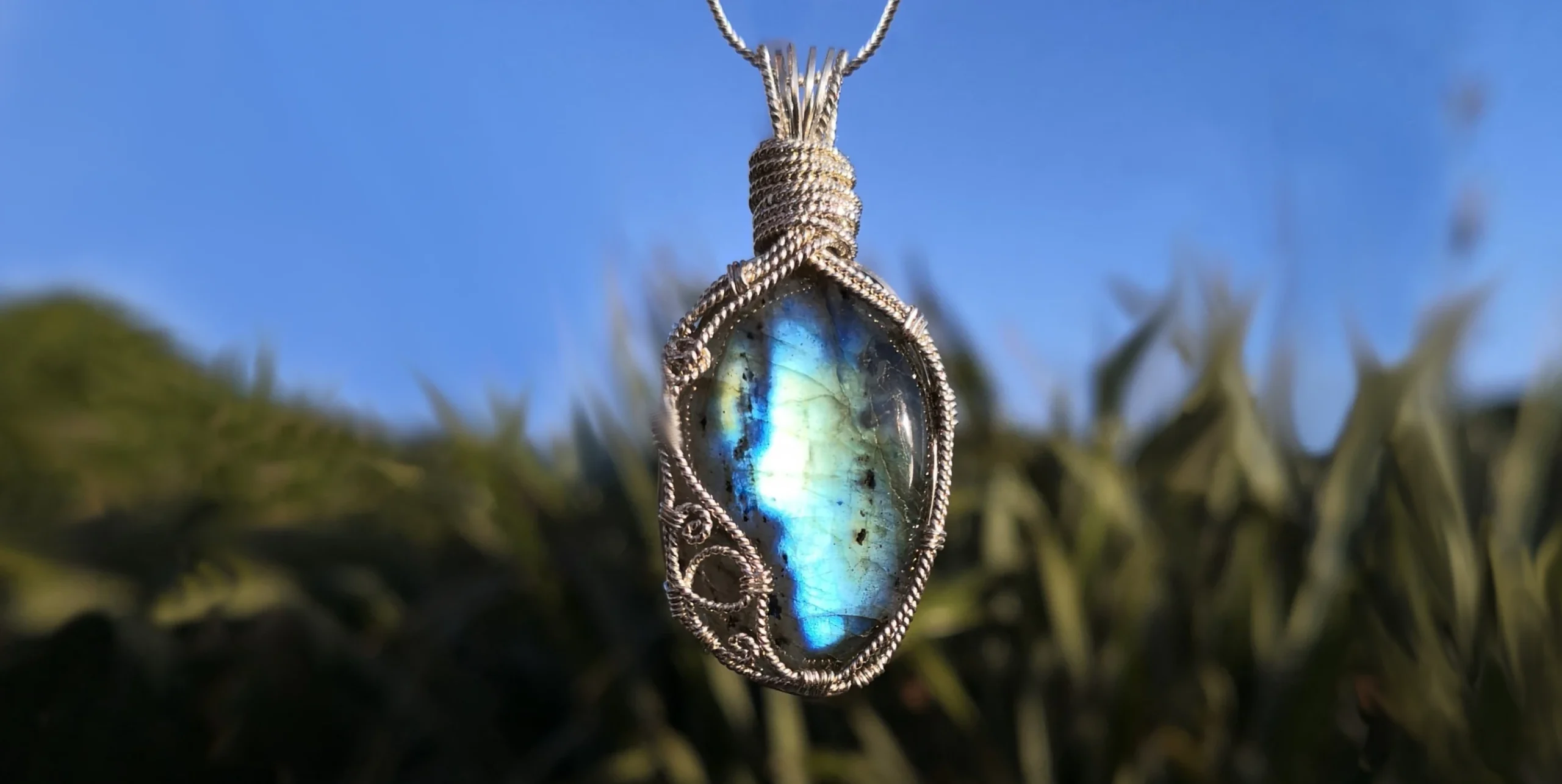 Spiritual healing crystals and gemstones from New Zealand and worldwide, handmade and wire-wrapped in sterling silver 925, 9ct gold, 14k gold-filled and coated copper