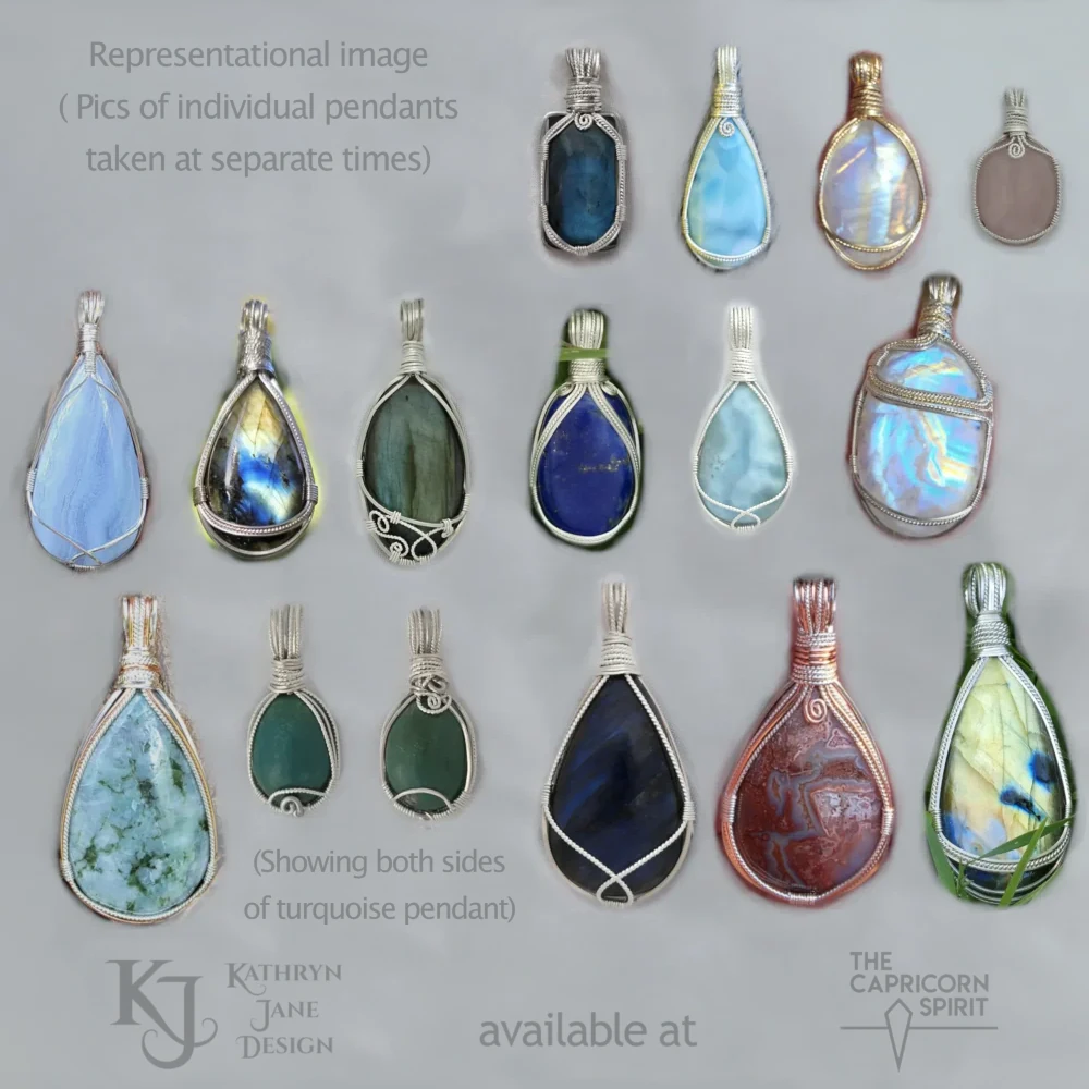 Wire-wrapped sterling silver gemstone pendants on a white satin background. Kathryn Jane Design pendants available at The Capricorn Spirit